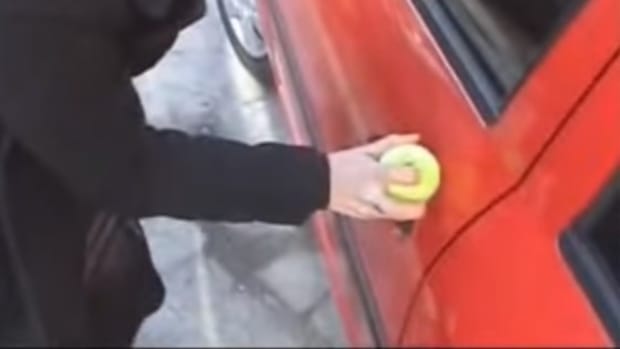 Woman Unlocks Car With Tennis Ball (Video) Promo Image