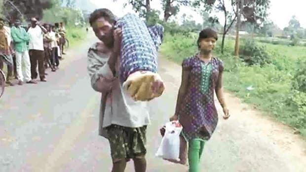 Man Carries Dead Wife On His Back For 6 Miles (Video) Promo Image