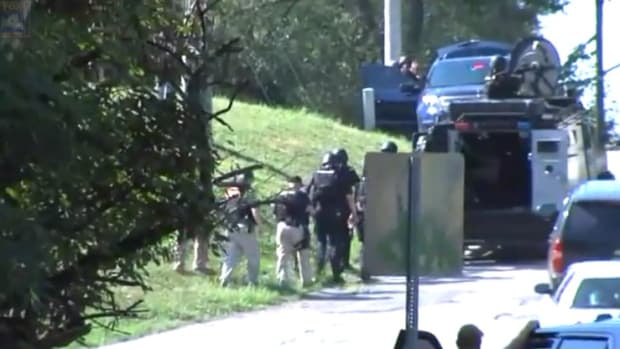 Police Quit Armed Standoff With Sex Offender (Video) Promo Image