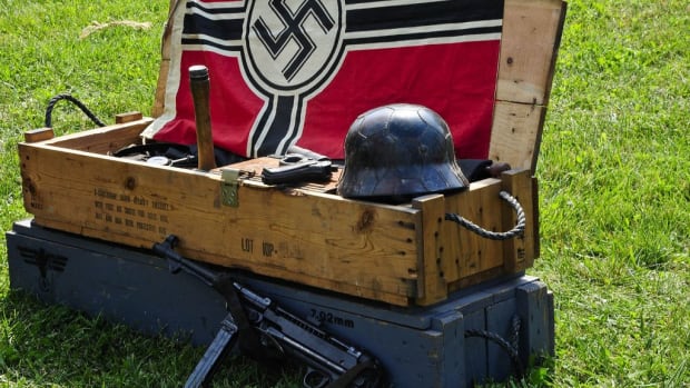 Woman Confronts Neighbor Flying Nazi Flag (Video) Promo Image