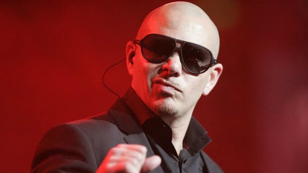 Pitbull Sends Plane For Puerto Rico Cancer Patients Promo Image