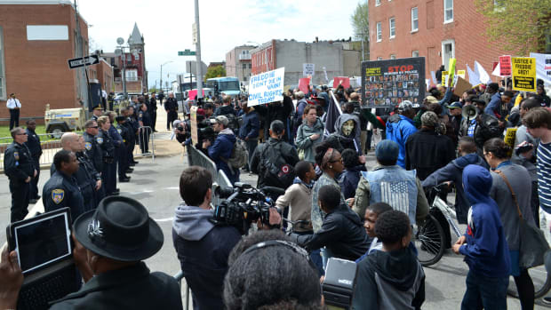 DOJ Drops Charges Against Officers In Freddie Gray Case Promo Image