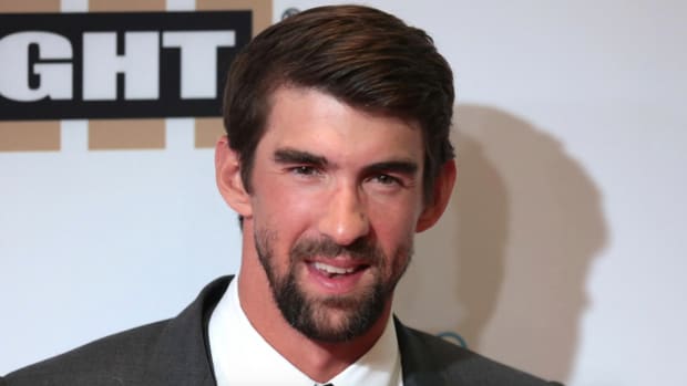Viewers Furious: Michael Phelps Races Simulated Shark (Video) Promo Image