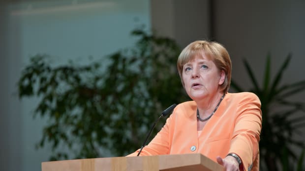 Angela Merkel Rejects Refugee Limits For Germany Promo Image