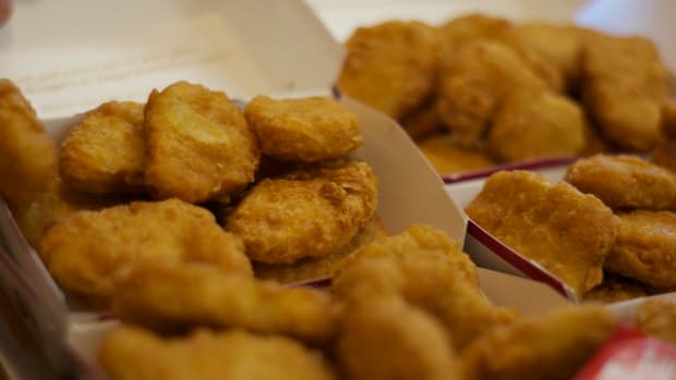 Man Feeds Girlfriend Chicken Nuggets, Image Goes Viral (Photos) Promo Image