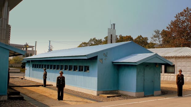 Soldiers At The Border Between North And South Korea