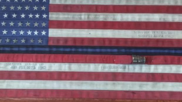 'To Me, That's A Slap In The Face': Judge Tells Sheriff To Take Down American Flag Display Promo Image