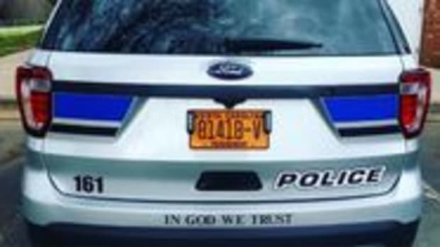 In God We Trust Sticke rOn Police Car In Charlotte