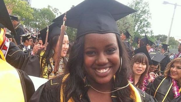 Woman's Controversial Graduation Picture Sparks Debate (Photo) Promo Image