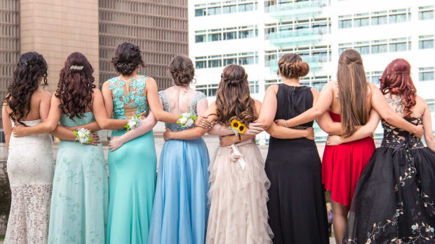 Teens in prom dresses