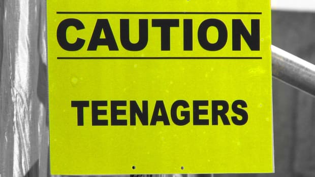 'Caution: Teenagers' sign