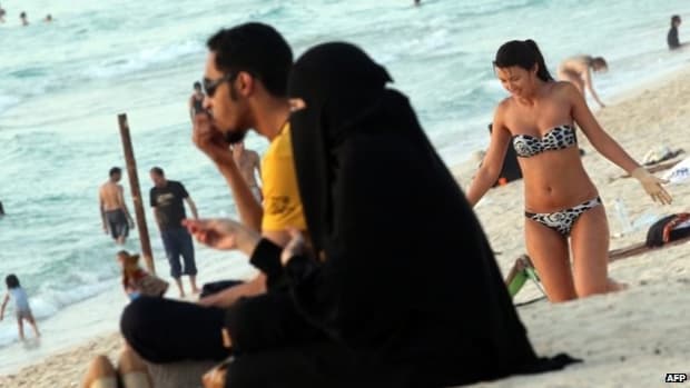 Woman Loses Custody of Children Because She Wore a Bikini to the Beach Promo Image