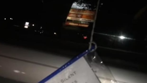 Man Manages To Pass DUI Checkpoint With This Sign - All Without Ever Rolling Down His Window (Photo) Promo Image