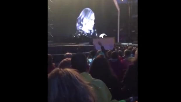 Adele Tells Fan To Stop Filming During Concert (Video) Promo Image