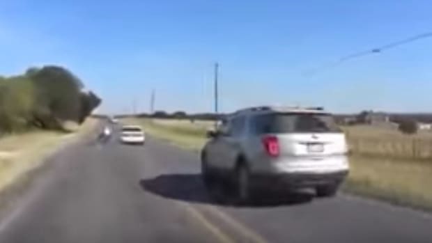 Driver Swerves Into Motorcyclist.