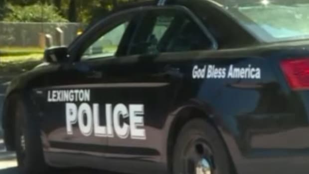 police car with 'god bless america' on it