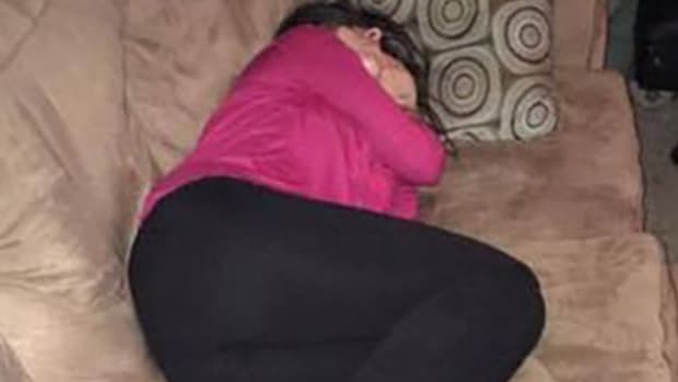 drunk girl sleeping on stranger's couch