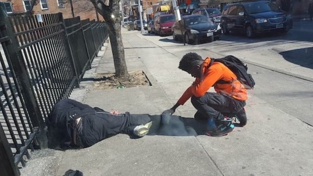 Teen Prays Over Homeless Man (Photos) Promo Image