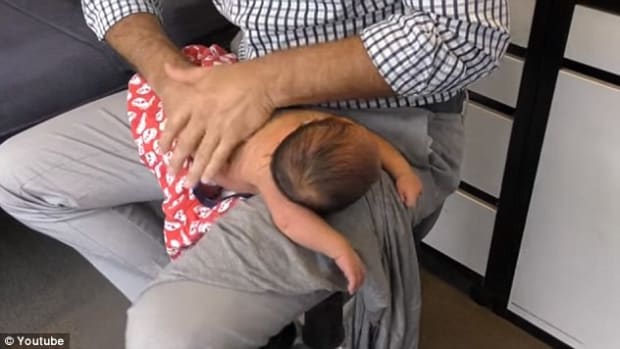 Chiropractor Cracks Baby's Spine (Video) Promo Image