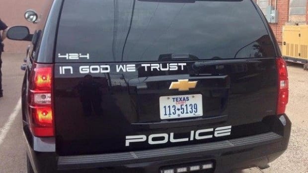 "In God We Trust" On Patrol Cars