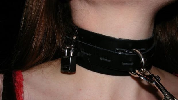 Girl with dog collar 2025