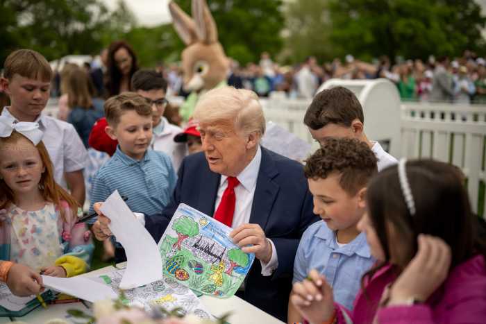 President Donald Trump with kids at the 2025 White House Easter Egg Roll, Photo Credit: The white House/X