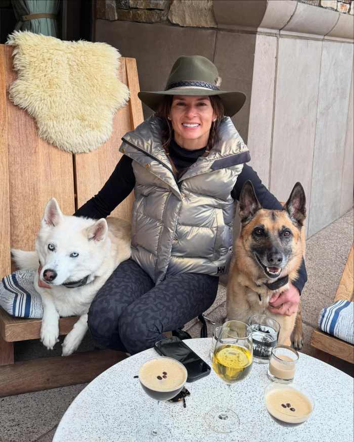 Danica Patrick sitting with her dogs, Photo Credit: danicapatrick/Instagram