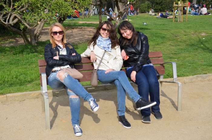 Three girls sitting on a bench without an actual seat, Photo Credit: Reddit