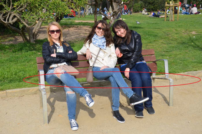 Three girls sitting on a seatless bench, Photo Credit: Reddit