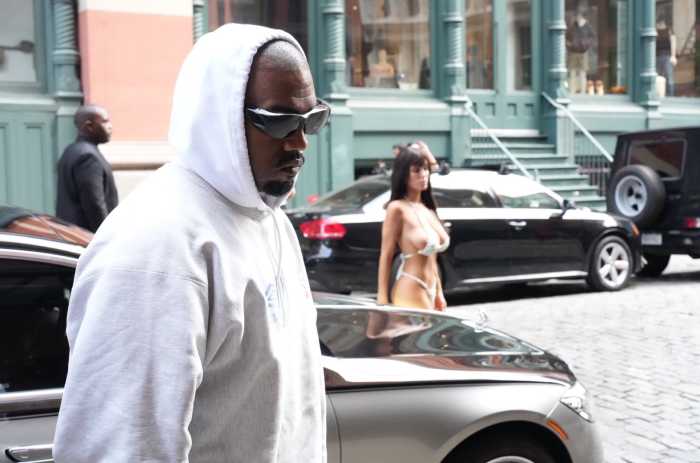 Bianca Censori was spotted wearing a bikini made out of candy walking with Kanye West, Photo Credit: Abhay/X
