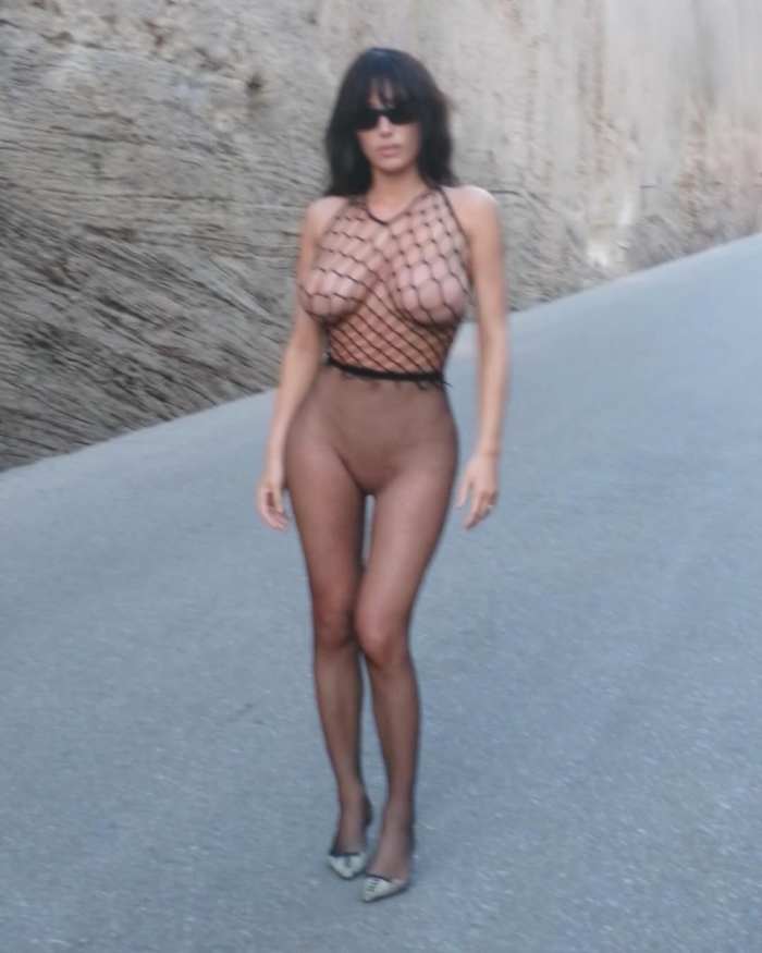 Bianca Censori wearing fishnet bodysuit, Photo Credit: biancacensori/Instagram