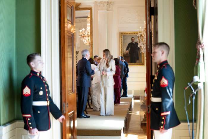 US First Lady Melania Trump wearing a power pantsuit during a meeting of the White House Task Force on Artificial Intelligence Education, Photo Credit: Office of the First Lady/X