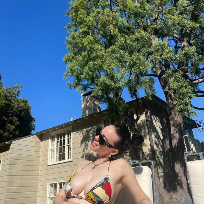 Billie Eilish in a rare bikini photo posted on Instagram with her chest tattoo visible, Photo Credit: annabelzimmer/Instagram