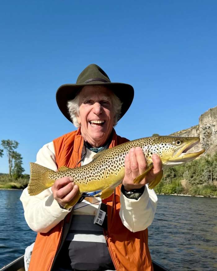 Henry Winkler holding a fish while smiling, Photo Credit: hwinkler4real/Instagram