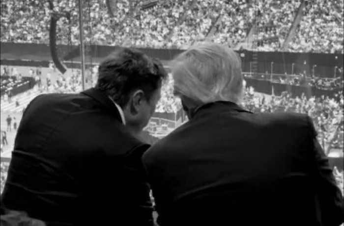 President Donald Trump and Elon Musk sitting together at Charlie Kirk's Memorial, Photo Credit: The White House/X