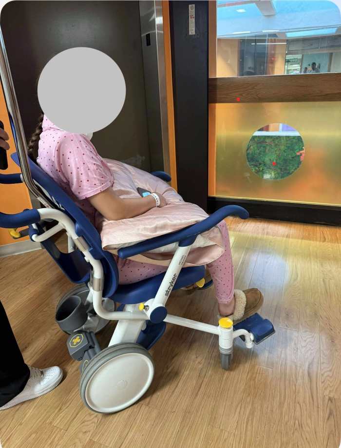 Jesse Butler's victim sitting in a wheelchair, Photo Credit: Justinthenickofcrime/Facebook