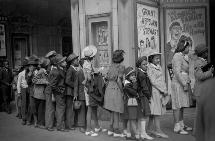 Waiting in the movie line, South Side of Chicago, 1941, photo by Edwin Rosskam, Photo Credit: Reddit