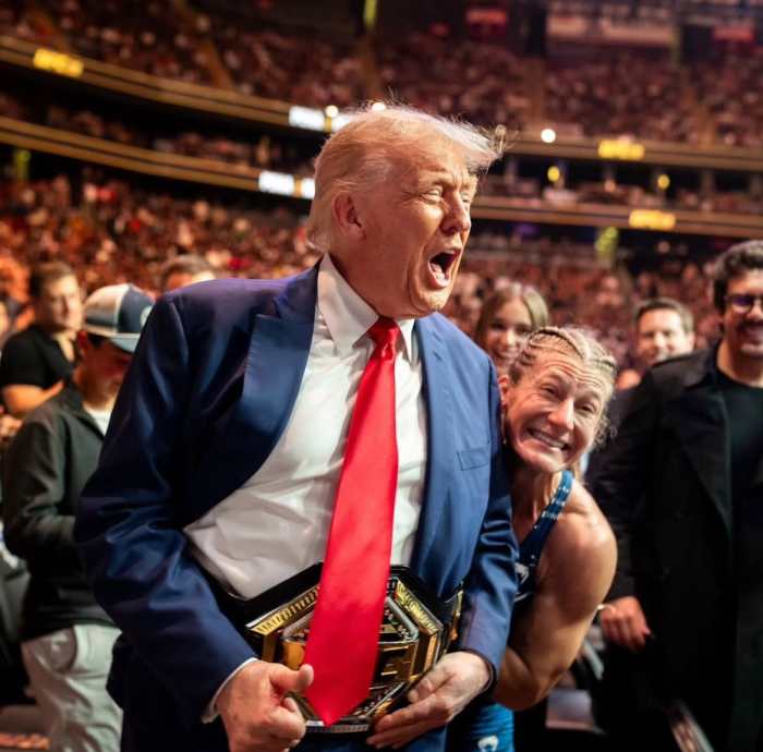 UFC Fighter Kayla Harrison putting her victory belt around President Donald Trump's waist, Photo Credit: MMA Roasted/X