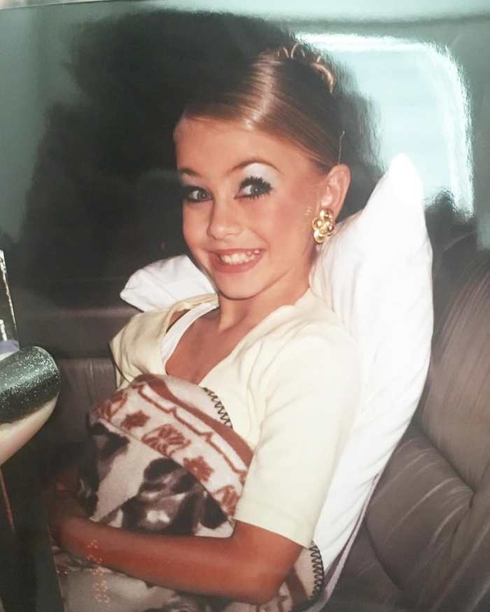 Julianne Hough smiling when she was 10 years old, Photo Credit: juleshough/Instagram