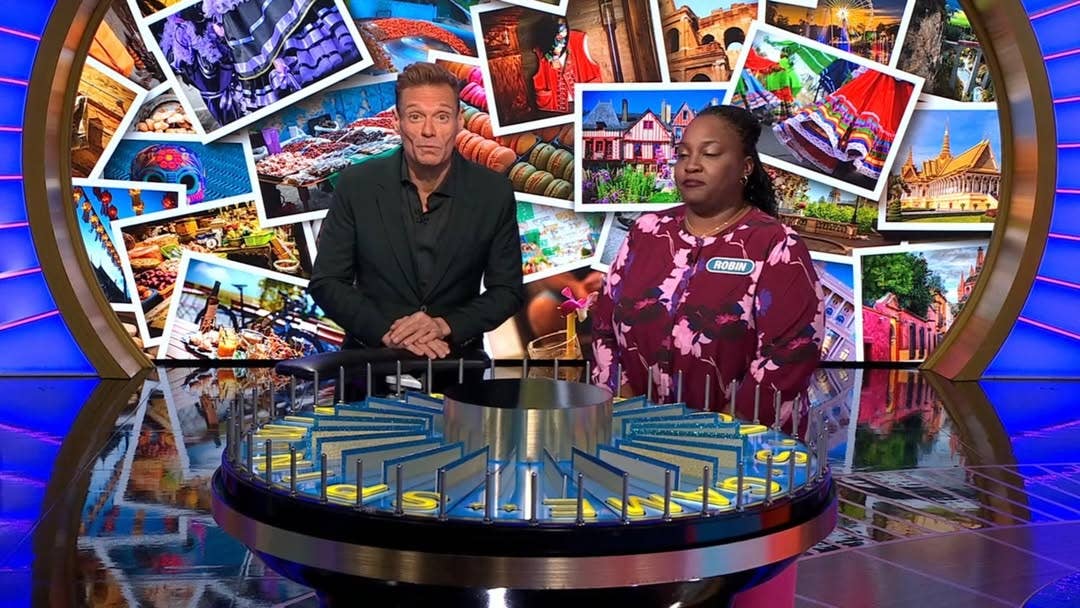 Wheel of Fortune contestant Robin and host Ryan Seacrest in an episode, Photo Credit: wheelwatchershub/Instagram