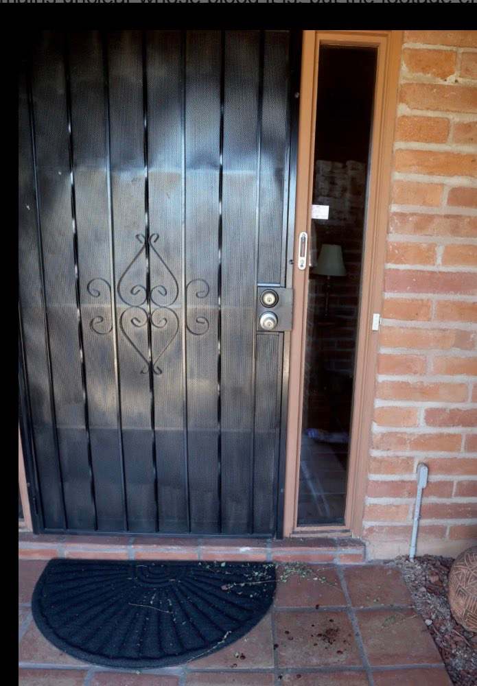 A surveillance photo of a masked individual taken from a doorbell camera at Nancy Guthrie's home, Photo Credit: savannahguthrie/Instagram