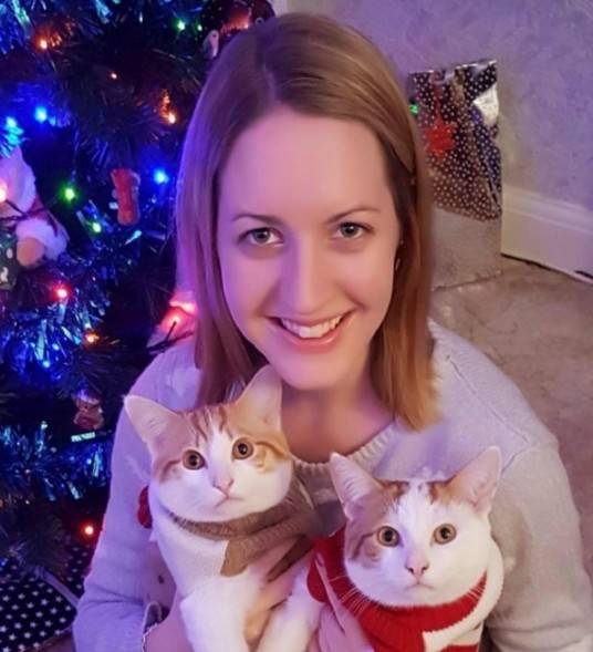 y Letby smiling while holding her two cats, Photo Credit: Ron Winter/X