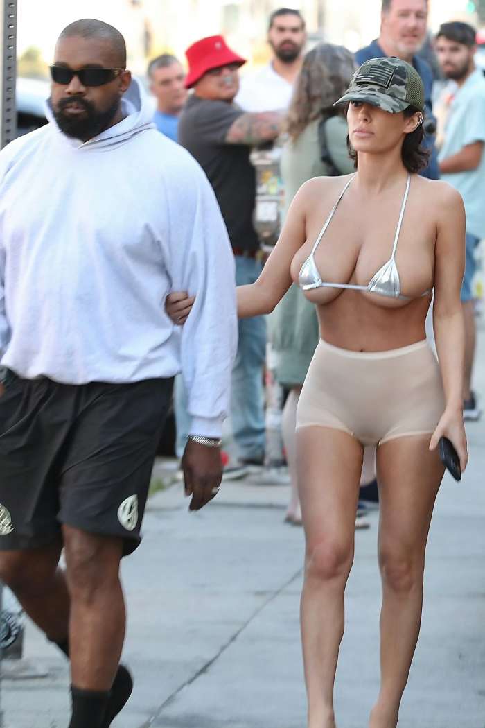 Bianca Censori spotted wearing revealing silver bikini top and skin tight briefs with husband Kanye West in Los Angeles, Photo Credit: DriveGreenLiveGreen/X