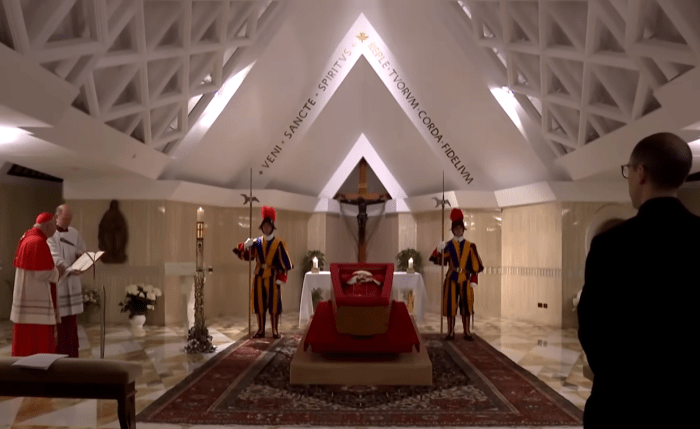 Pope Francis lying in an open coffin in the chapel of the Casa Santa Marta, Photo Credit: AFP News Agency/Youtube