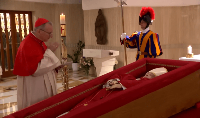 Pope Francis lying in an open coffin in the chapel of the Casa Santa Marta, Photo Credit: AFP News Agency/Youtube