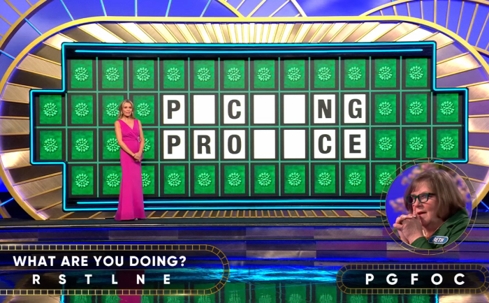 Show hostess Vanna White in a 'Wheel of Fortune' episode, Photo Credit: Wheel of Fortune/Youtube