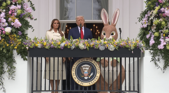 Donald and Melania Trump with a bunny mascot during the Annual Egg Roll at the White House, Photo Credit: The White House/Youtube
