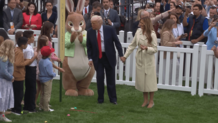 Donald and Melania Trump with a bunny mascot during the Annual Egg Roll at the White House, Photo Credit: The White House/Youtube
