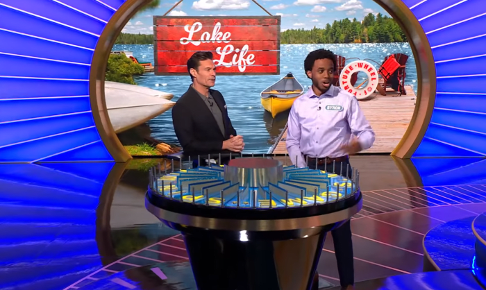 Show host Ryan Seacrest and contestant Byron Bernard in a 'Wheel of Fortune' episode, Photo Credit: Wheel of Fortune/Youtube