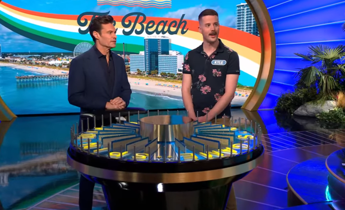 Show host Ryan Seacrest and contestant Kyle MacDonald in a 'Wheel of Fortune' episode, Photo Credit: Wheel Of Fortune/Youtube